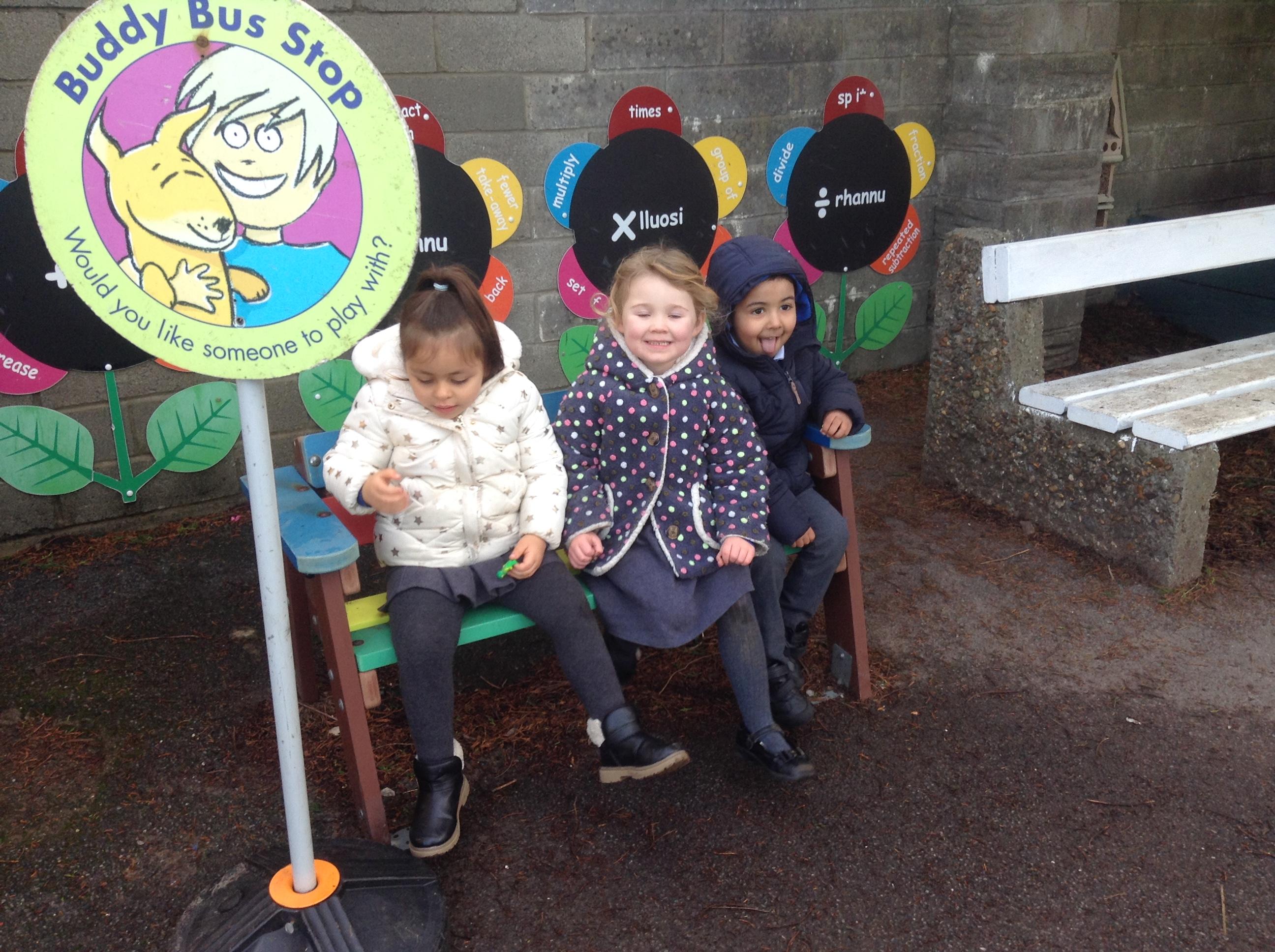 The Buddy Bus Stop helps us outside! 